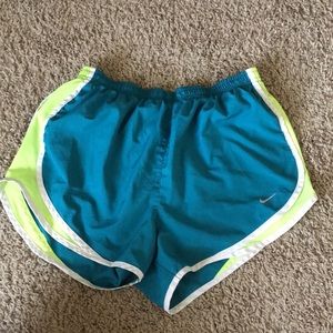 Nike Dri-fit teal and neon yellow running shorts